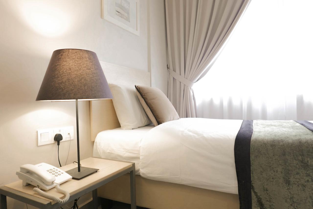 Country Inn Kulai Bagian luar foto