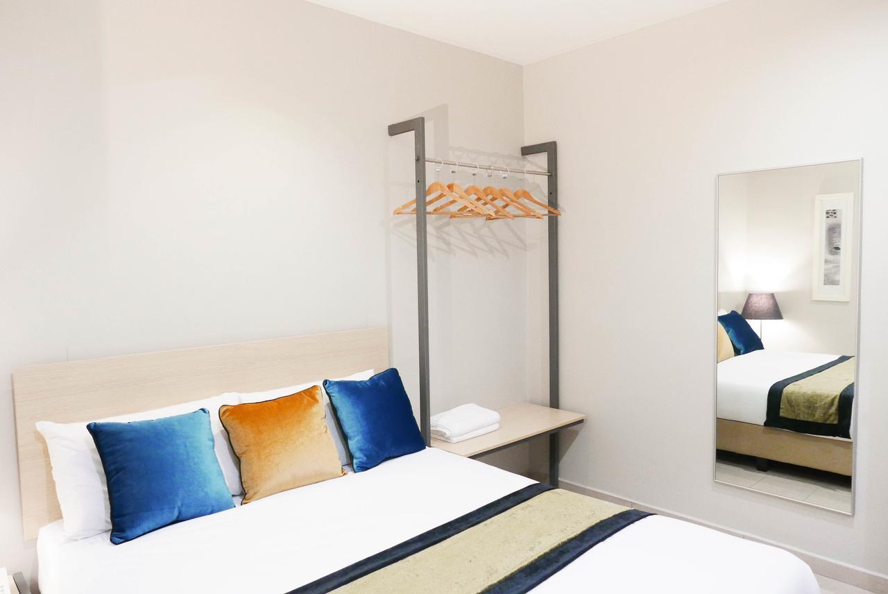 Country Inn Kulai Bagian luar foto